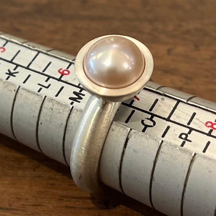 Button pearl ring