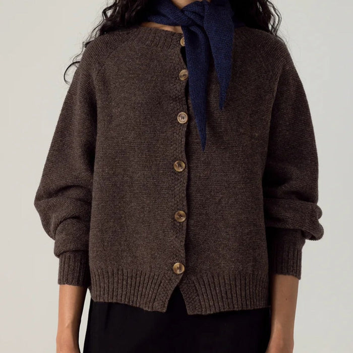 Francie Loft Cardigan in brown air-spun 100% merino wool with back button detail, raglan sleeve, garter stitch texture and slightly cropped length