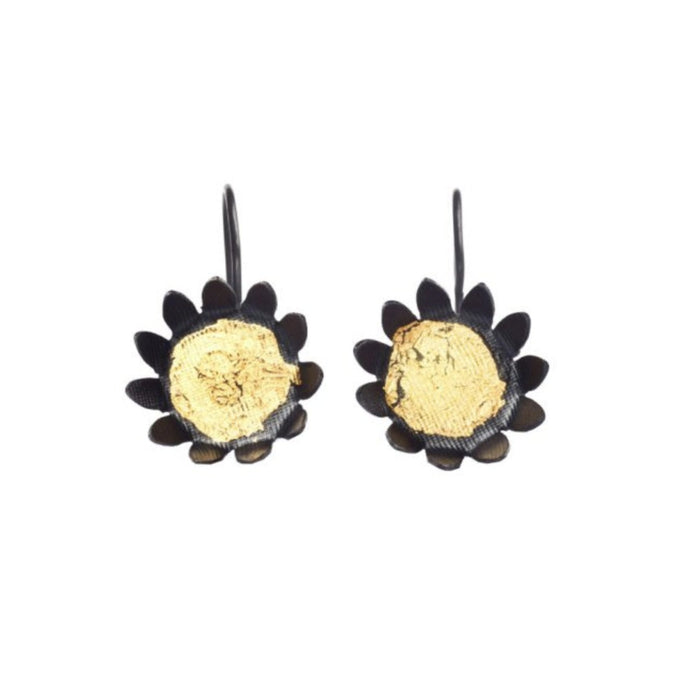 Yuko Fujita sunflower hook earrings, oxidised silver petals around a 24ct gold leaf centre, on a white background