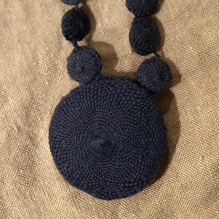Deep purple crocheted puffy disc necklace