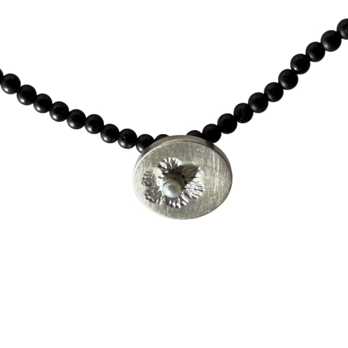 Vintage flower stamp necklace on onyx beads