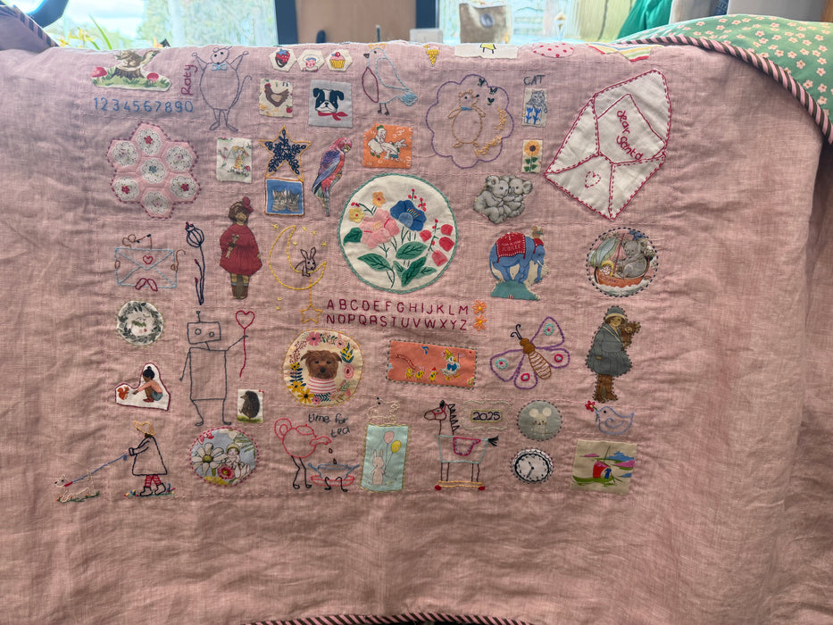 Rose pink hand stitched   baby  quilt