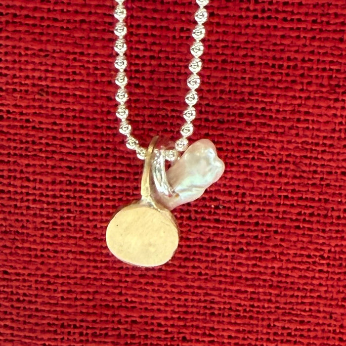 Fine pearl charm necklace