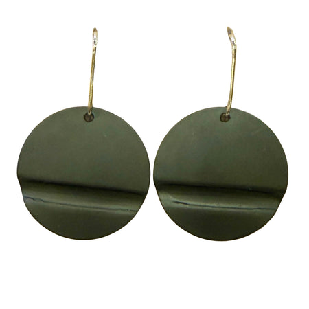 Green circular earrings on a beige card with 'Bourne' branding.
