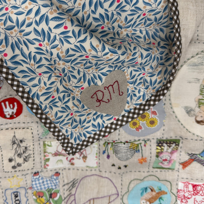 Hand stitched baby quilt