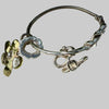 Silver bracelet with floral charms on a large shell