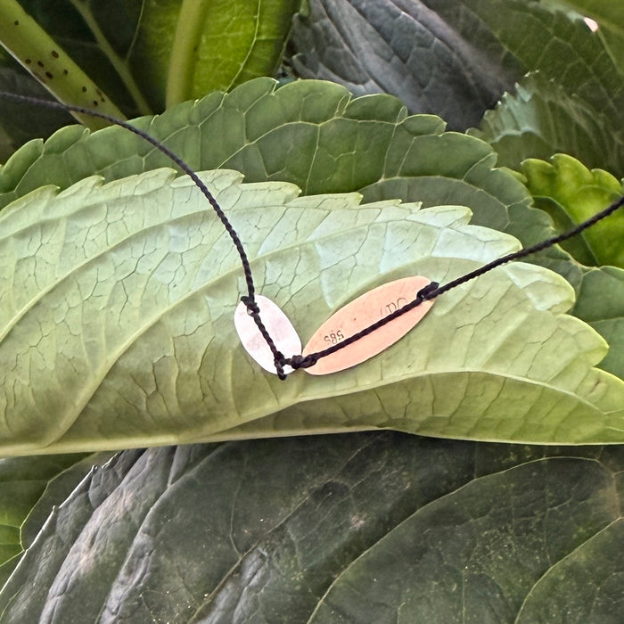 Simple black silk necklace with charms