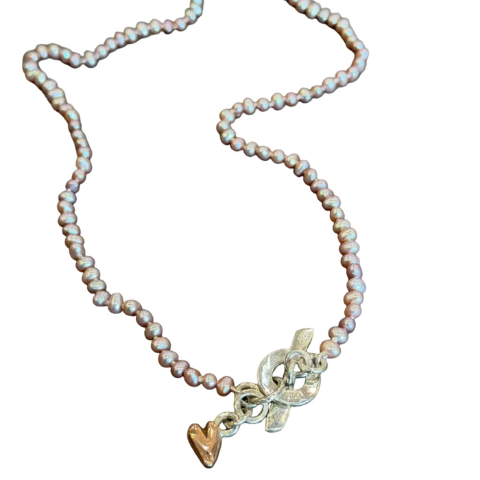 Seed pearl necklace with rose gold heart