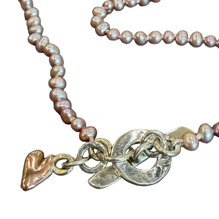 Seed pearl necklace with rose gold heart