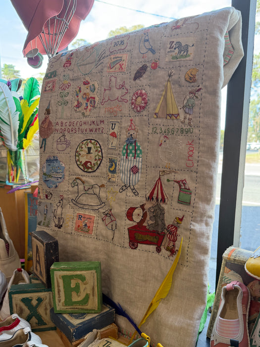 Hand stitched baby quilt in linen and cotton