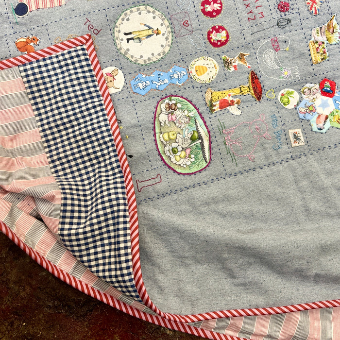 Hand stitched baby quilt