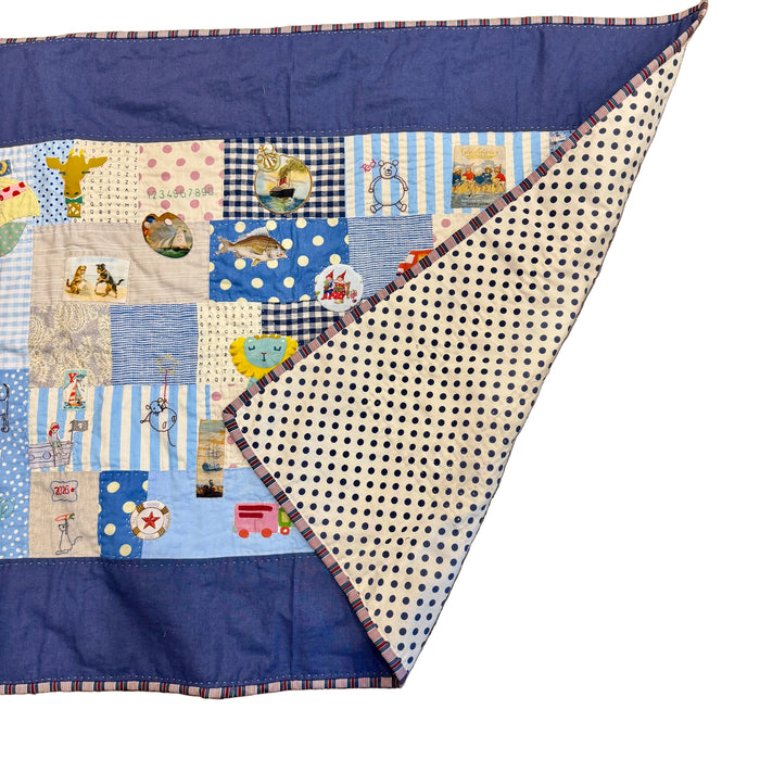 Hand stitched baby quilt in linen and cotton (blues)