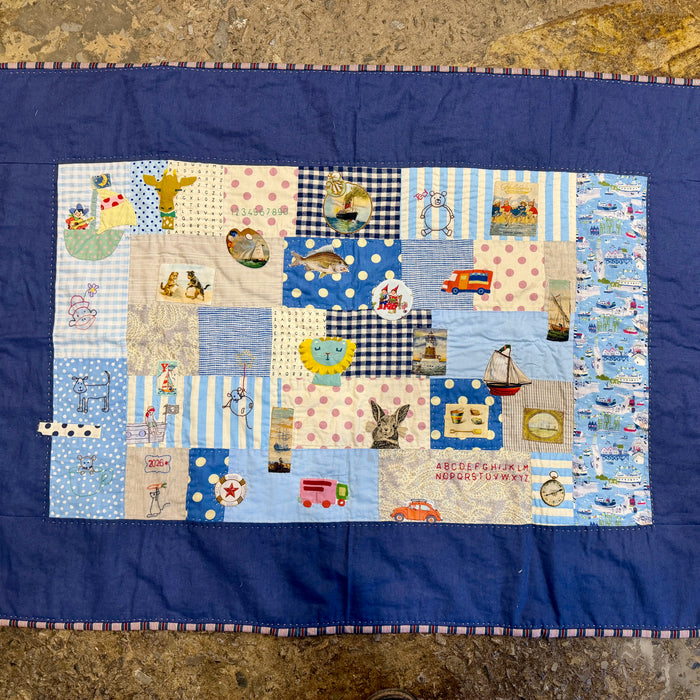 Hand stitched baby quilt in linen and cotton (blues)