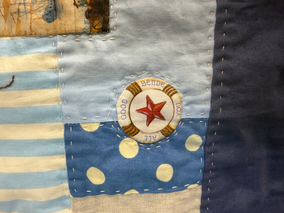 Hand stitched baby quilt in linen and cotton (blues)