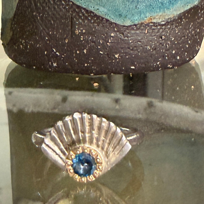 Bay of fires ring with gold & blue topaz