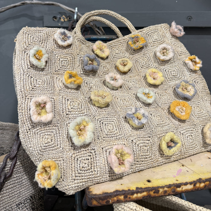 Raffia tote with appliqued flowers