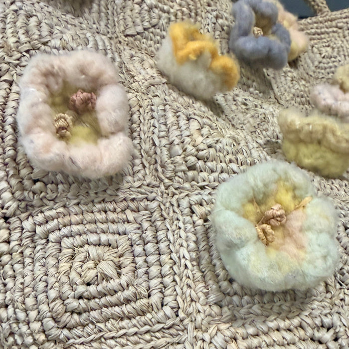 Raffia tote with appliqued flowers