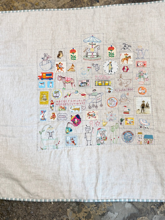 Hand stitched baby quilt in linen & cotton