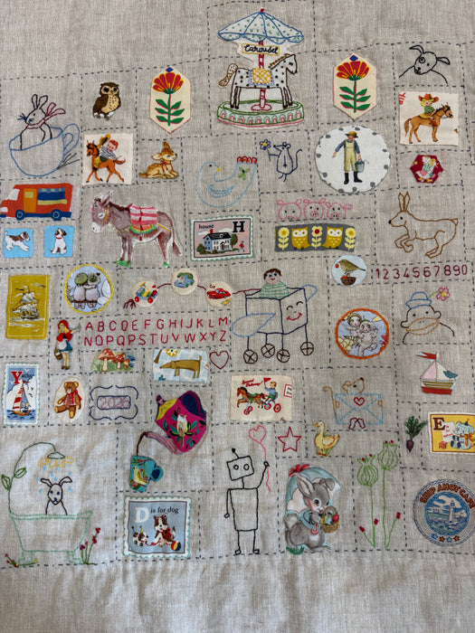 Hand stitched baby quilt in linen & cotton