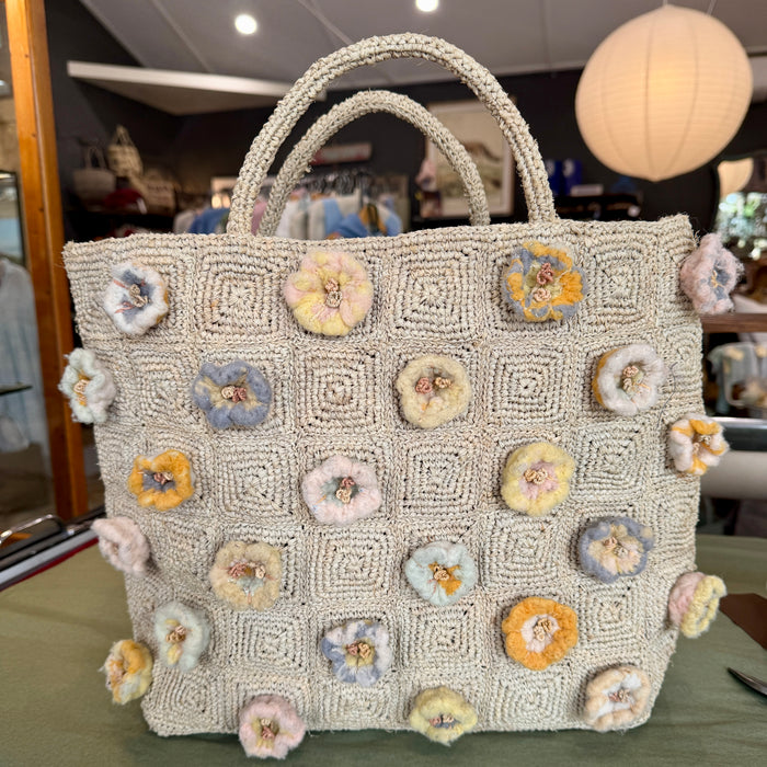 Raffia tote with appliqued flowers