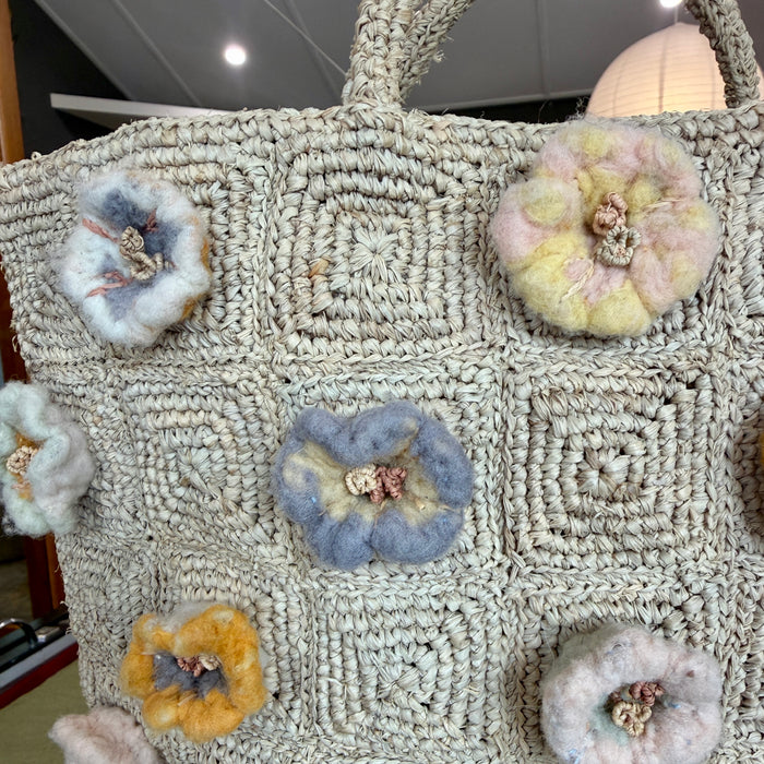 Raffia tote with appliqued flowers