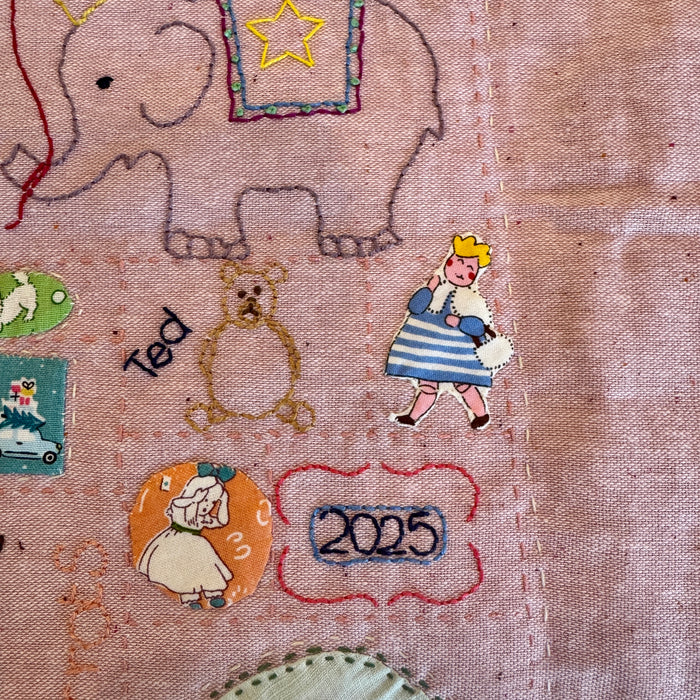 Rose pink hand stitched   baby  quilt