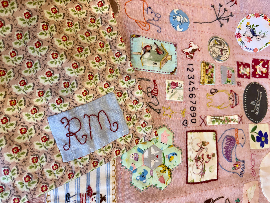 Rose pink hand stitched   baby  quilt
