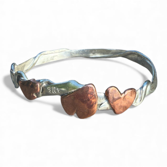 Silver and copper heart bangle
