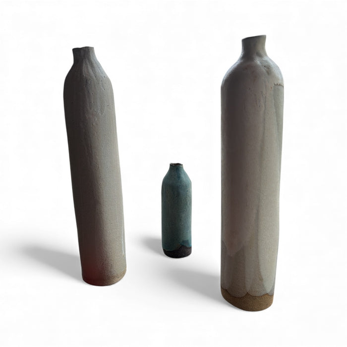 X tall bottle form vessels