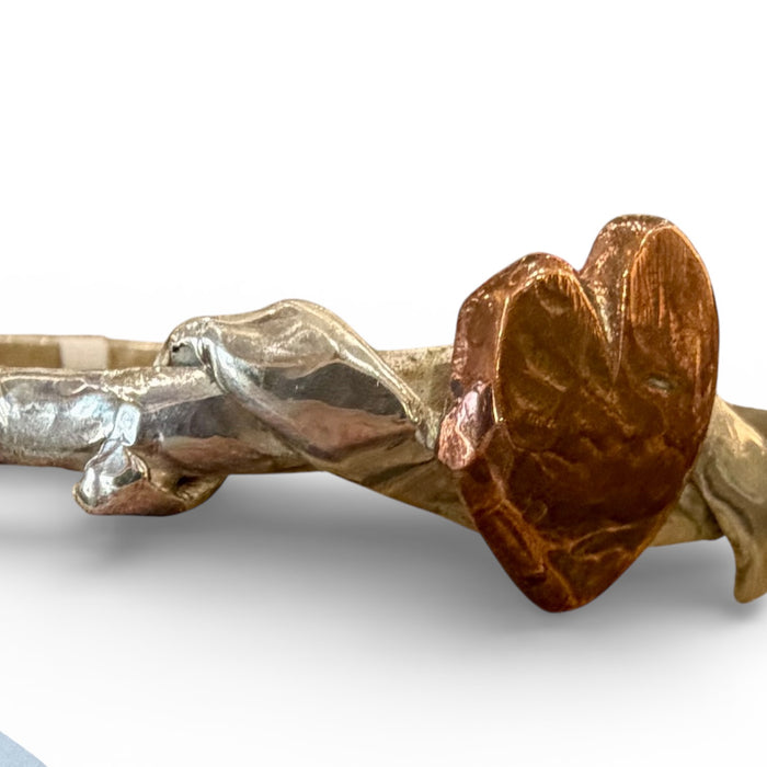 Silver and copper heart bangle