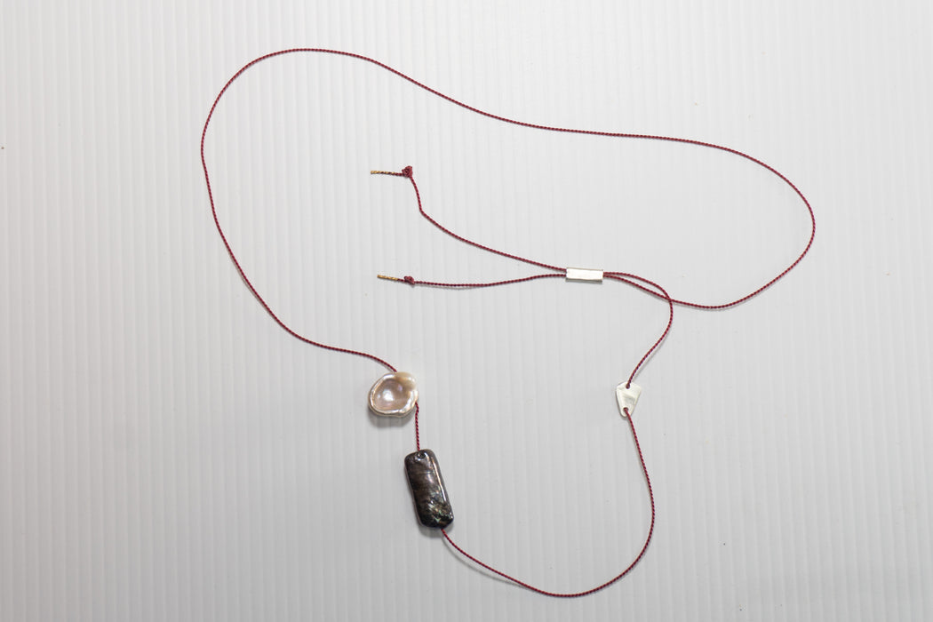 Simple silk necklace with charms