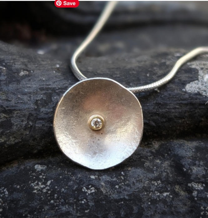 Lunar pendant with diamond