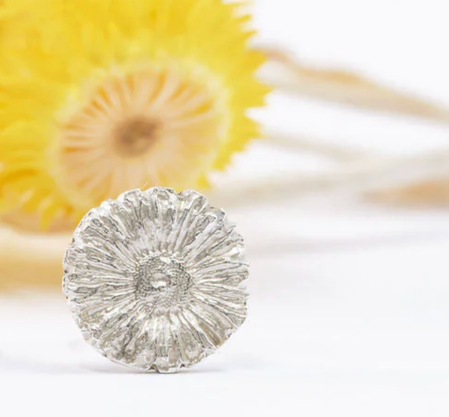 Silver shell or flower studs