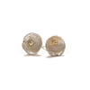 Close-up of Shimara Carlow acorn cup stud earrings showing reticulated silver texture and 18ct gold bead detail