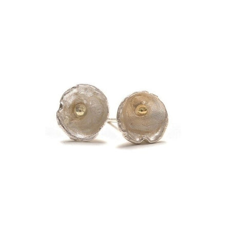 Close-up of Shimara Carlow acorn cup stud earrings showing reticulated silver texture and 18ct gold bead detail
