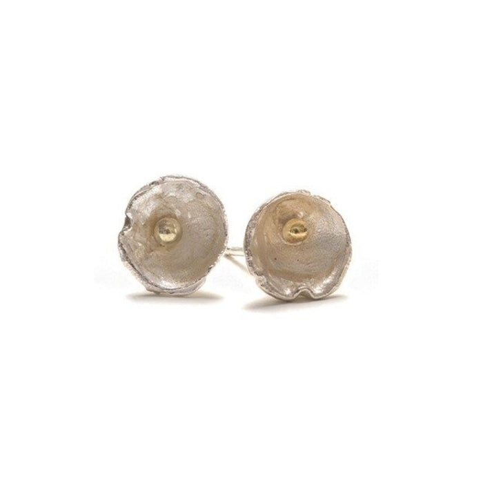 Close-up of Shimara Carlow acorn cup stud earrings showing reticulated silver texture and 18ct gold bead detail