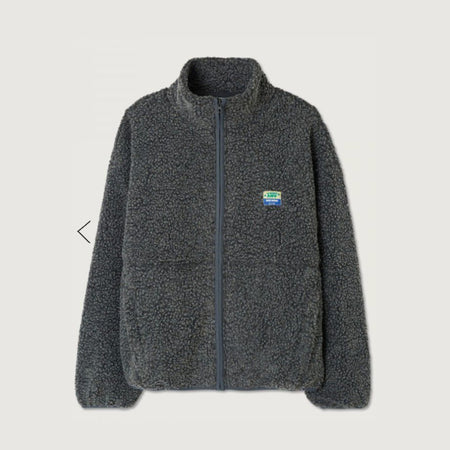 American Vintage charcoal grey sherpa fleece zip jacket laid flat, with stand collar, front pockets and AMV chest patch