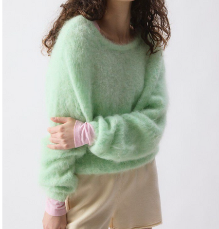 Model wearing the American Vintage Nib fluffy knit jumper in mint green