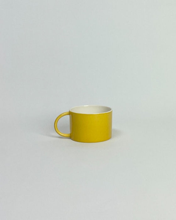 Anne Black Candy Cup Wide in mango yellow glaze, hand-thrown porcelain wide coffee mug