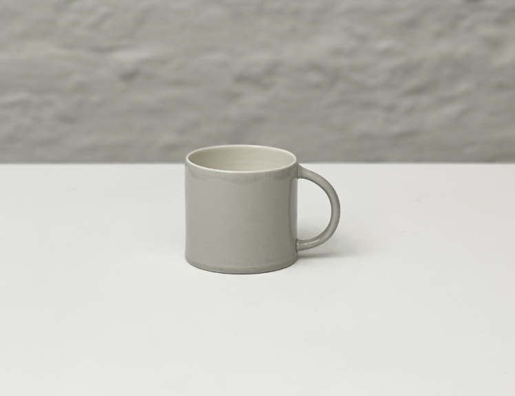 Anne Black coffee (tall) mug in terracotta
