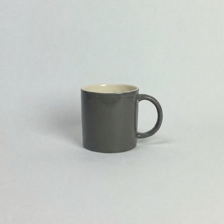 Anne Black tall ceramic coffee mug in eucalyptus grey glaze with cream interior