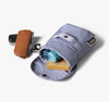 Bellroy Cinch Pocket in lilac haze, open with keys and everyday items inside