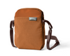 Bellroy City Pouch crossbody bag in bronze with brown strap, front view