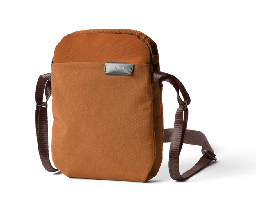 Bellroy City Pouch crossbody bag in bronze with brown strap, front view