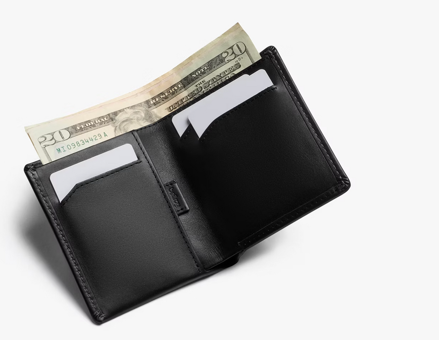 Inside the Bellroy Note Sleeve leather wallet in black, with notes and cards