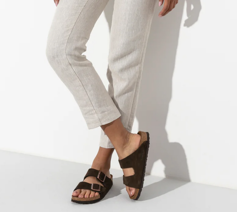 Birkenstock Arizona soft footbed sandal in mocha suede, worn with cream trousers