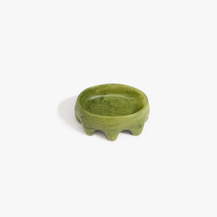 Crown Dish by Dinosaur Designs in translucent olive green resin with marbled swirl pattern — round trinket dish with sculptural scalloped base
