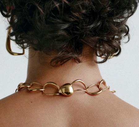 Dinosaur Designs Liquid chain choker in gold worn, back of the neck