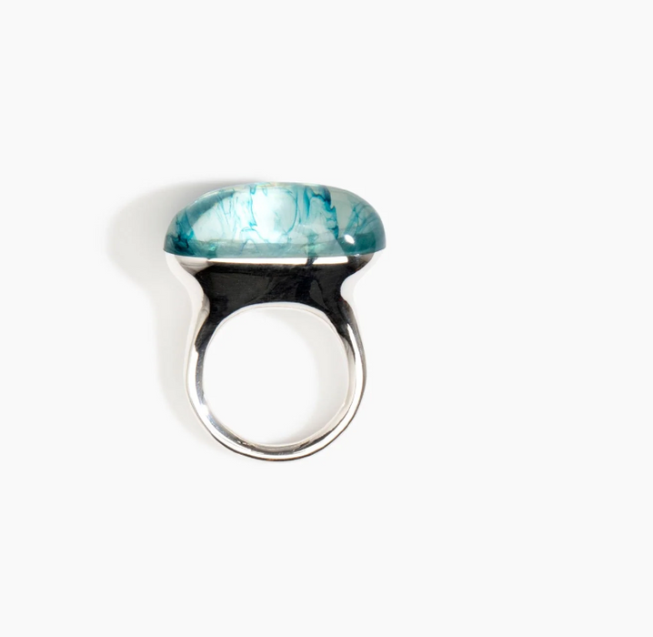 Dinosaur Designs Long watercolour ring in water blue resin, front view