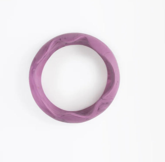 Dinosaur Designs Paradise resin bangle in grape purple, top view